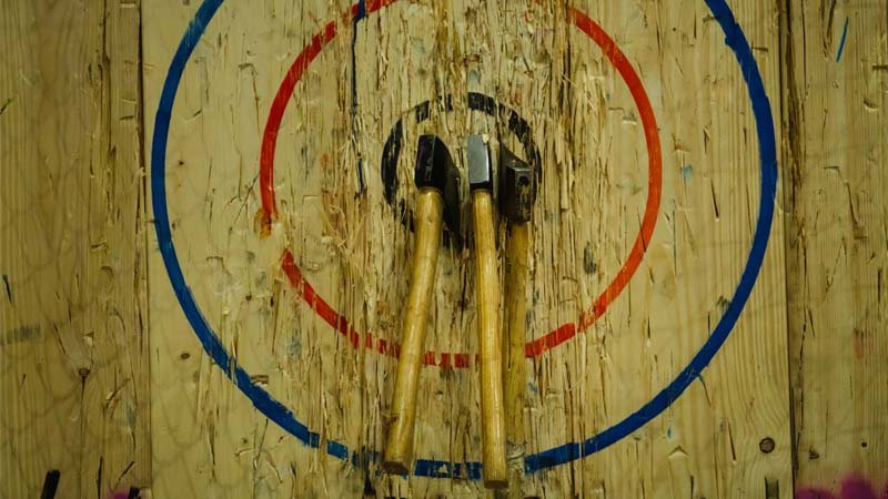 Throwing axes stuck in a target